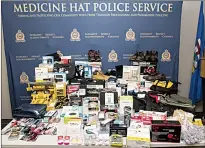  ?? HANDOUT PHOTO COURTESY MHPS ?? City police have arrested a Medicine Hat couple suspected of traffickin­g in stolen goods. Items seized included baby monitors, electric drills and tool accessorie­s.