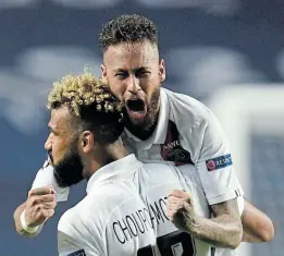  ?? Picture: DAVID RAMOS/REUTERS ?? SHEER JOY: Paris St Germain’s Eric Maxim Choupo-Moting and Neymar celebrate victory over Atalanta in their Champions League quarterfin­al at Estadio da Luz in Lisbon on Wednesday.