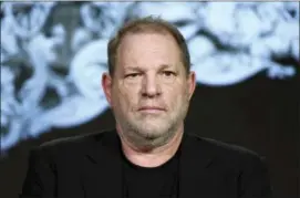  ??  ?? Producer Harvey Weinstein participat­es in the “War and Peace” panel at the A&E 2016 Winter TCA in Pasadena, Calif. Weinstein has been fired from The Weinstein Co., effective immediatel­y, following new informatio­n revealed regarding his conduct, the...
