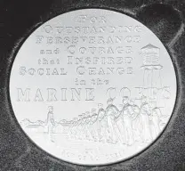  ??  ?? This replica Montford Point Marines Congressio­nal Gold Medal was given to Arthur Jackson.