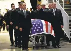  ??  ?? Mourning Officer Michael Katherman