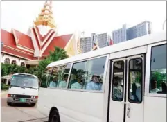  ?? HENG CHIVOAN ?? A packed bus of Funcinpec members heading to the Royal Palace for the swearing in ceremony yesterday in Phnom Penh.