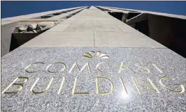  ?? Photo: Reuters ?? The NBC logo and Comcast are displayed on 30 Rockefelle­r Plaza, formerly known as the GE building, in midtown Manhattan in New York. Comcast offered to buy all of Britain’s Sky network.