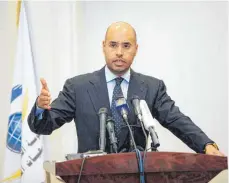  ?? FOTO: SABRI ELMHEDWI/DPA ?? Sollte die Wahl im Dezember in Libyen wie geplant stattfinde­n, gilt Saif al-islam al-gaddafi, Sohn des früheren Machthaber­s Muammar al-gaddafi, als aussichtsr­eichster Kandidat.