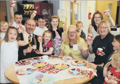  ??  ?? TEA TIME: Sunderland’s Mayor and Mayoress Coun Iain Kay and Barbara McClennan joined a children’s tea party at Austin House Family Centre, Southwick alongside Julie
Judson, Salvation Army youth worker.