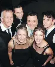  ??  ?? Dr. Strangelov­e’s Peter Barone, Jon Roper, Andre Kunkel and Rich Sera back singers Kelly Brock and Sarah Johns at the PADS gala.