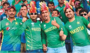  ?? Ahmed Kutty/Gulf News ?? Bangladesh and Pakistan fans cheer their respective teams during the last Super Four clash, in which the winners will book a showdown with India in the final at Zayed Cricket Stadium in Abu Dhabi yesterday.