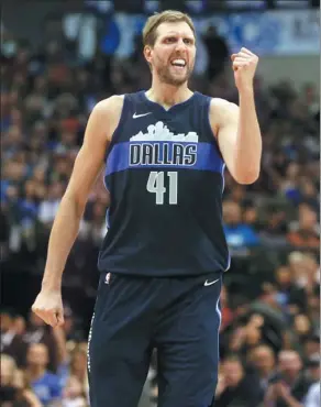  ?? LM OTERO / AP ?? The Dallas Mavericks’ Dirk Nowitzki clenches a fist in delight during Saturday’s NBA game against the Oklahoma City Thunder. The German scored 19 points as the Mavs won 97-81.