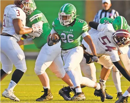  ?? PAUL W. GILLESPIE/CAPITAL GAZETTE ?? Arundel running back Jaire Le’Mon, pictured against Annapolis on April 1, had 30 carries for 119 yards and a touchdown to help the Wildcats rally to beat Meade on Friday night.
