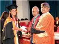  ?? ?? Graduatesh­ip In Chemistry student receiving her award.