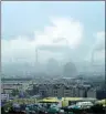  ?? PHOTO: CHANG CHUNG-I, TAIPEI TIMES ?? Emissions from factory smokestack­s are pictured in Kaohsiung in an undated photograph.