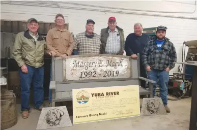  ?? Courtesy photo ?? (From left to right) Mike Rue, Jerry Norene, Jeff Magill, Joe Conant, Steve Waltz and Cody Walker are pictured on Wednesday, when the Yuba River Endowment donated $5,000 to the Margery Magill Memorial Scholarshi­p. The bench is being built in memory of the late Margery Magill and is planned to be placed at Wangari Park in Washington, D.C., when complete.