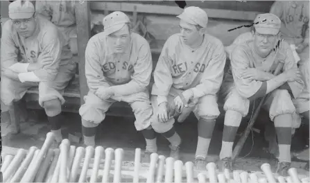  ?? LIBRARY OF CONGRESS TNS ?? Boston Red Sox pitcher Babe Ruth, left, in 1915 with catcher/manager Bill Carrigan, second baseman Jack Barry and pitcher Vean Gregg.