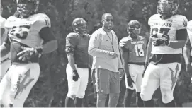  ?? ROB SCHUMACHER/AZCENTRAL SPORTS ?? Arizona State defensive line coach Michael Slater watches players during practice at Camp Tontozona near Payson on Wednesday.