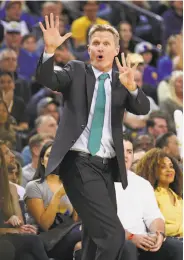  ?? Scott Strazzante / The Chronicle ?? Kerr, signaling a play in a March game against the Grizzlies, wants his players to have fun.