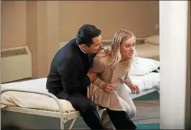  ?? PHOTO BY BONNIE OSBORNE COURTESY OF PANTELION FILMS ?? Michael Pena stars as Father Lozano and Olivia Taylor Dudley as Angela Holmes in “The Vatican Tapes.”