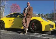  ??  ?? Todd Duncan drove the Porsche 911 Carrera 4S he subscribed to through the Porsche Passport program.