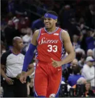  ?? MATT SLOCUM - ASSOCIATED PRESS ?? Tobias Harris and his fellow Sixers, new and old, had plenty to smile about Friday in a 117-110 win over Denver.