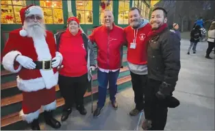  ?? ?? Santa, Dawn, Mayor Grebien, Michael Walas, and Mario Hilario.