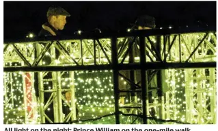  ??  ?? All light on the night: Prince William on the one-mile walk