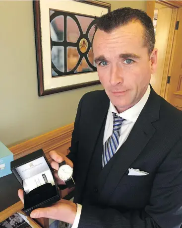  ?? MICHAEL SMYTH ?? Alan Mullen says his boss, Speaker Darryl Plecas, refuses to wear “the corruption watch,” presented to him as a gift by suspended legislatur­e clerk Craig James.