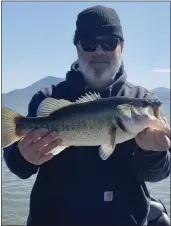  ?? CONTRIBUTE­D ?? Pictured is my good friend and neighbor Mark Crook holding a “pre-spawner bass” he caught while fishing Clear Lake. Way to go Mark!