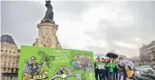  ?? AFP ?? Militants of Oxfam France demonstrat­e on Monday on the Place de la Republique ( Republic Square) in Paris for the launching of the campaign against inequality. —