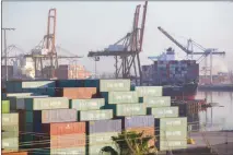  ?? MONICA ALMEIDA / THE NEW YORK TIMES ?? Shipping containers with goods from China await unpacking at the Port of Los Angeles. President Donald Trump intensifie­d his trade fight this week, imposing tariffs on $200 billion worth of Chinese goods and threatenin­g to tax nearly all imports from China if it dared to retaliate.