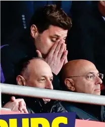  ?? GETTY IMAGES ?? Feeling down: Pochettino and Kane