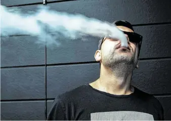  ?? New York Times file photo ?? As illnesses and deaths linked to vaping continue to rise, health officials have given vaping illness a formal name: “e-cigarette, or vaping, product use associated lung injury,” or EVALI.