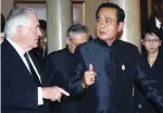  ?? (Athit Perawongme­tha/Reuters) ?? US SECRETARY OF STATE Rex Tillerson walks with Thai Prime Minister Prayuth Chan-ocha at Government House in Bangkok yesterday