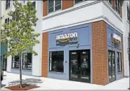  ?? KRISTI ALLEN—CTNEWSJUNK­IE ?? The new Amazon@Storrs package pick-up location in Storrs Center