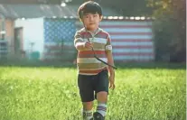  ?? A24 ?? Young Alan S. Kim may be the most scene-stealing cast member in the Sundance hit “Minari,” about a South Korean family in Arkansas.