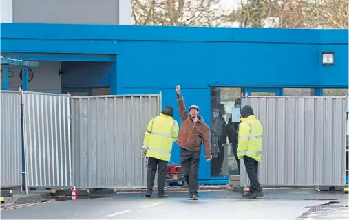  ??  ?? HAPPY: Matt Raw, who was repatriate­d from Wuhan, leaves Arrowe Park Hospital on Merseyside where he spent two weeks in quarantine