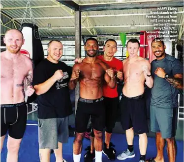  ??  ?? HAPPY TEAM: Brook stands with Fewkes [second from left] and sparring partners Jimmy Kelly [far left], Samuel Vargas [third right] and Dan West [second right]