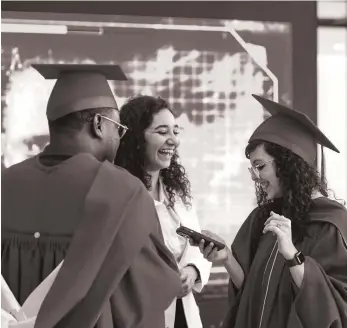  ?? Khushnum Bhandari / The National ?? Graduates meet their families and friends after the commenceme­nt ceremony at MBZUAI in Abu Dhabi. MBZUAI is accelerati­ng developmen­t of the AI ecosystem