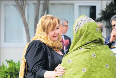  ?? PHOTO / FILE ?? Christchur­ch Member of Parliament Megan Woods meets with members of the Muslim community the day after the terror attacks.