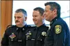  ?? JOSE QUEZADA, HUMEDIA — FOR THE TIMESSTAND­ARD ?? Acting Chief Brian Stephens, left and former Chief Andrew Mills, right, stand with Officer Terry Liles during an event in 2017.