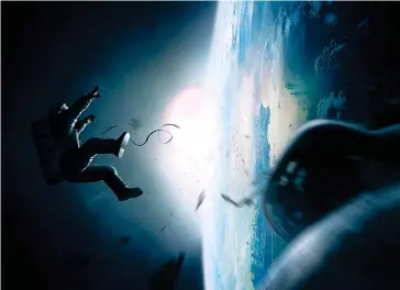  ??  ?? Réaliste. Le chercheur Roland Lehoucq juge le film « Gravity » plausible, à quelques détails près…