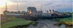  ?? DAMIAN HAWORTH ?? A new dawn for Ryde? The sun rises over the derelict hulk of the Southern Railway paddle steamer at Island Harbour Marina on the morning of May 30.