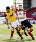  ??  ?? L2 battle Clyde’s Mark McLaughlin challenges Nathan Austin