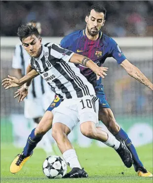  ?? FOTO: GETTY IMAGES ?? Dybala y Busquets, dos de los mejores jugadores de la Champions, se midieron el martes