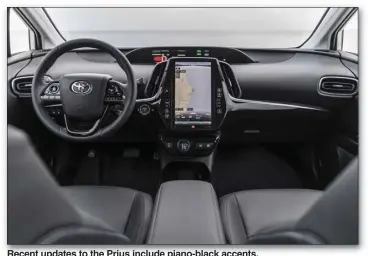  ??  ?? Recent updates to the Prius include piano-black accents.