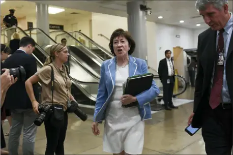  ?? SUSAN WALSH — THE ASSOCIATED PRESS FILE ?? In this file photo, Sen. Susan Collins, R-Maine, walks past reporters on Capitol Hill in Washington, as she heads to a briefing on election security. National money is already flowing into Maine’s 2020 Senate race, offering the latest indicator that incumbent Collins faces a stiff reelection fight.