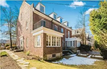  ?? GROUP STEPHEN POSKO/ATLAS ?? 614 West 40th Street in the Triangle Community of Roland Park is a semi-detached all-brick townhouse.