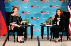  ?? — AFP photo ?? US Ambassador MaryKay Carlson (left) and Harris speak during the town hall meeting about the empowermen­t of women at the Sofitel Philippine Plaza in Pasay, Metro Manila.