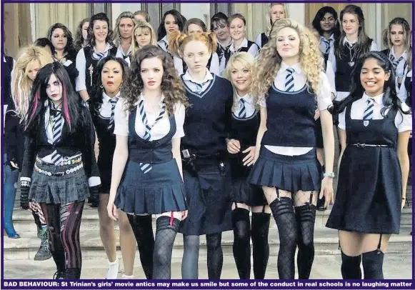  ??  ?? BAD BEHAVIOUR: St Trinian’s girls’ movie antics may make us smile but some of the conduct in real schools is no laughing matter