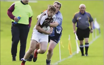  ??  ?? Coolboy’s Wayne Kinsella is forced over the line by Shillelagh’s Noel Murphy.