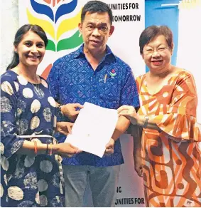  ?? ?? From left: AVI executive manager of Internatio­nal Services Ipsita Wright, South Pacific Business Developmen­t general manager Elrico Munoz and SPBD Fiji director Lorraine Seeto after the formal agreement.