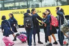  ?? Virendra Saklani/Gulf News ?? Students of JSS private school in Dubai return to school after a winter break yesterday.